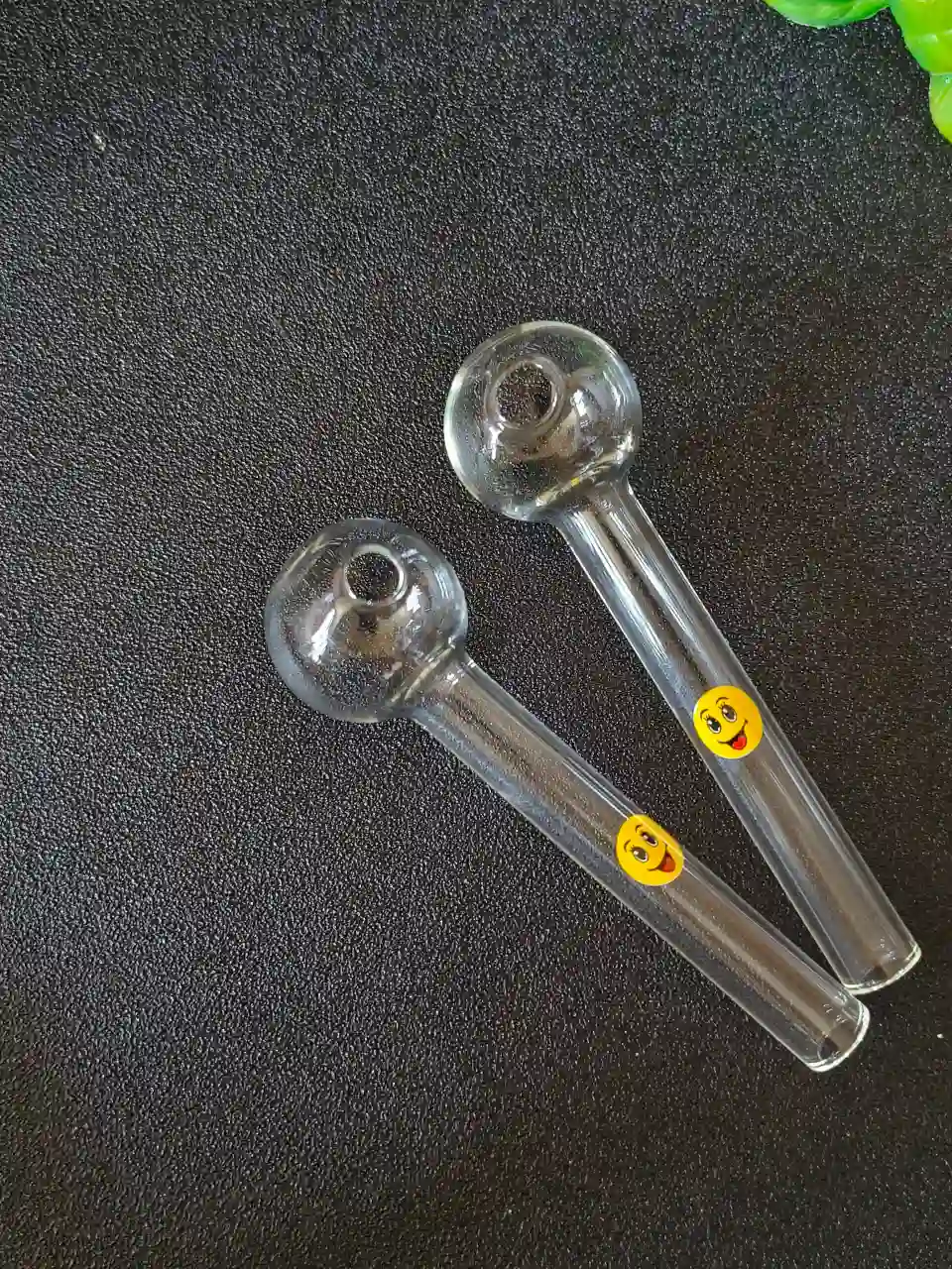 4-Inch Clear Borosilicate Glass Burner Pipe with Yellow Smiley Detail
